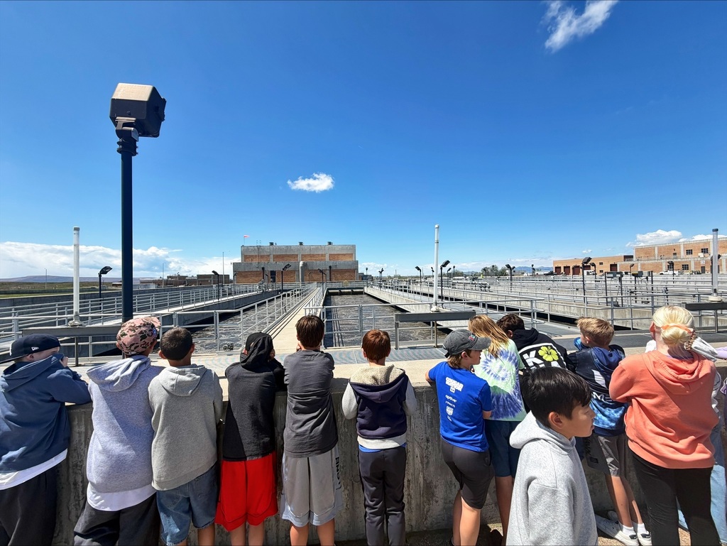 5th graders on a field trip to the landfill, sewer, water districts.
