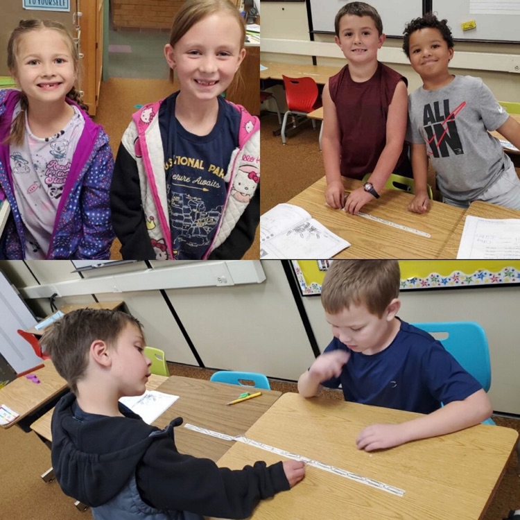 1st graders working on math skills with measurement