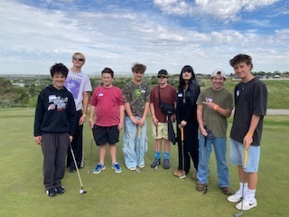 Unified Sports Team Playing golf