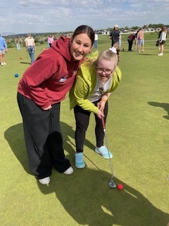 Unified Sports Team Playing golf