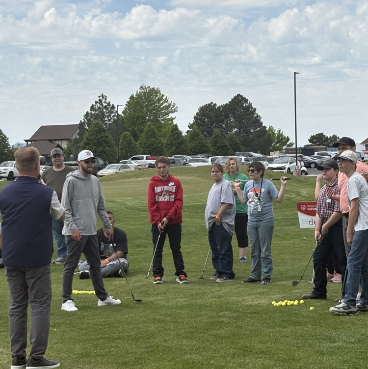 Students playing golf 