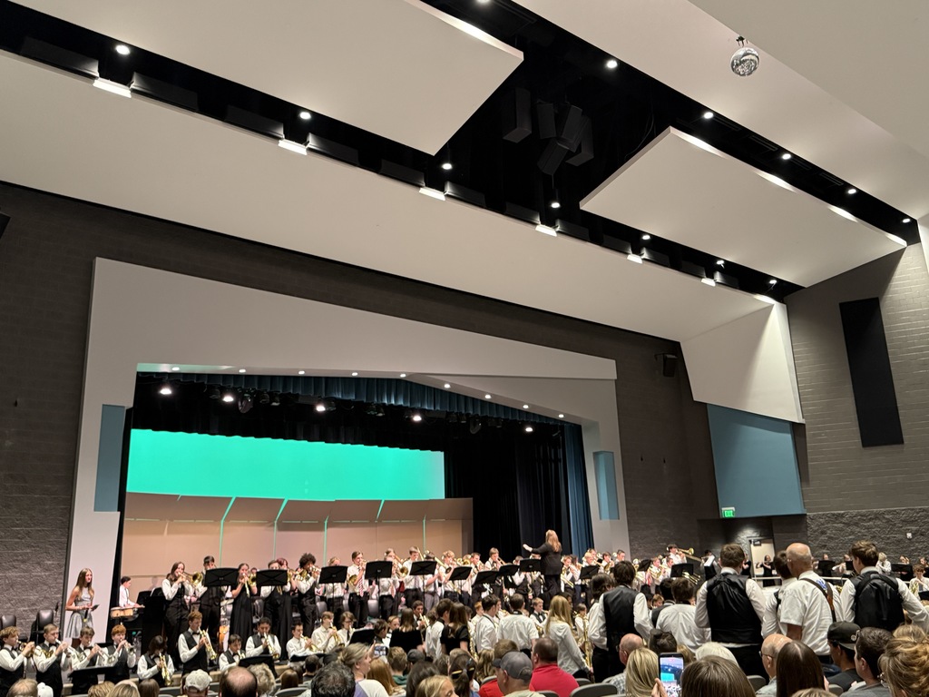 Combined bands performing military hymns. 