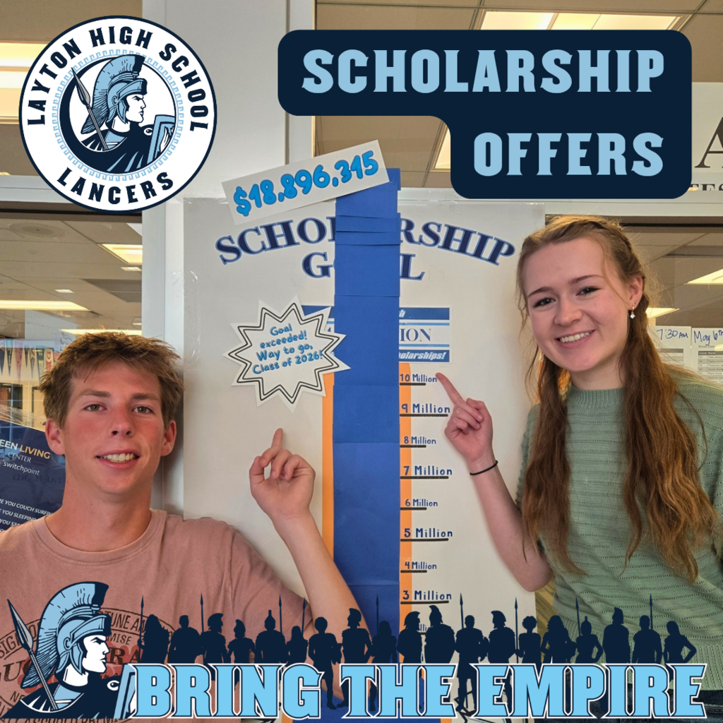 A male and a female student stand in front of a chart, showing almost nineteen million dollars in scholarships have been received by layton high lancers