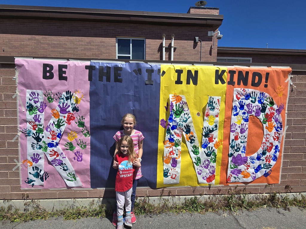 Students with the kindness sign