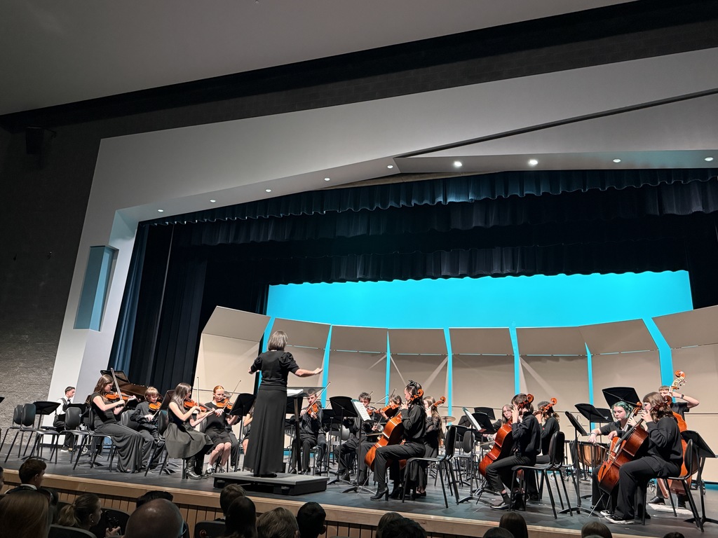 Beginning orchestra playing in the concert. 