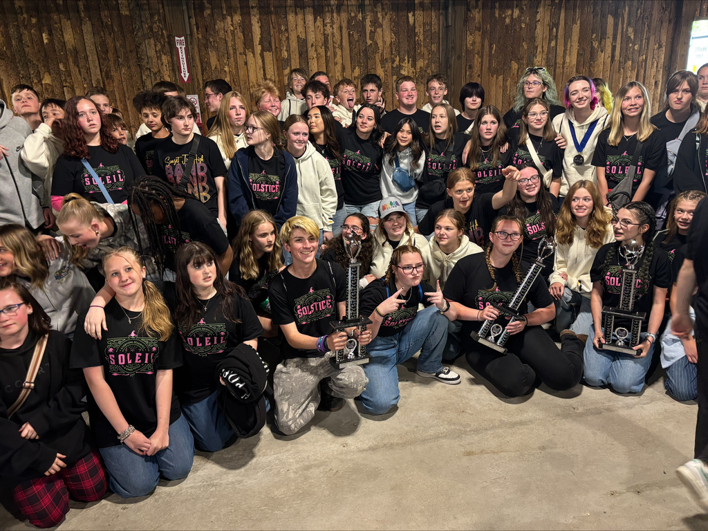 Group of choir and band students posing at Lagoon.