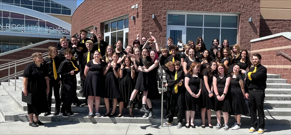 Solstice choir posing on school steps