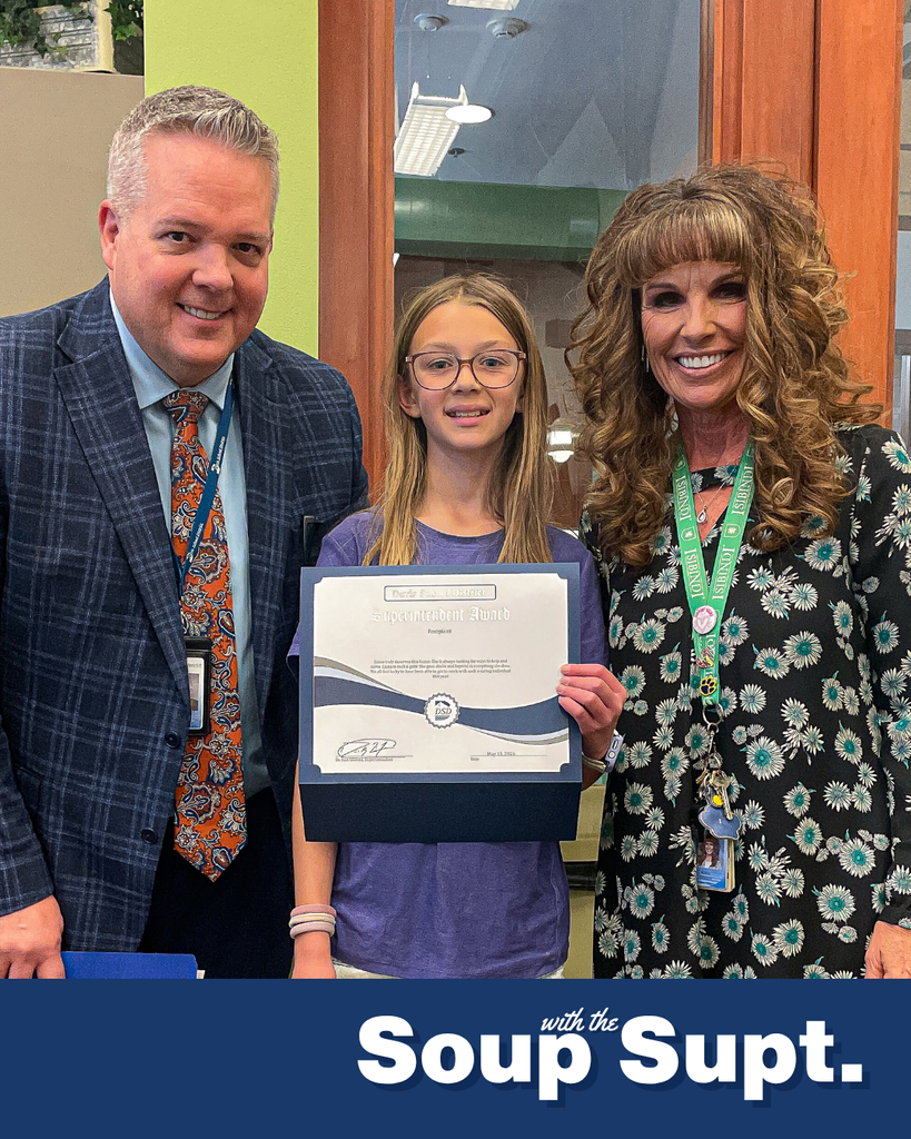 A student smiling with their principal and Dr. Linford, Davis School District Superintendent. 