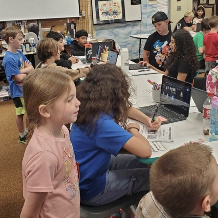 1st graders visiting 6th grade and hearing about their country reports 