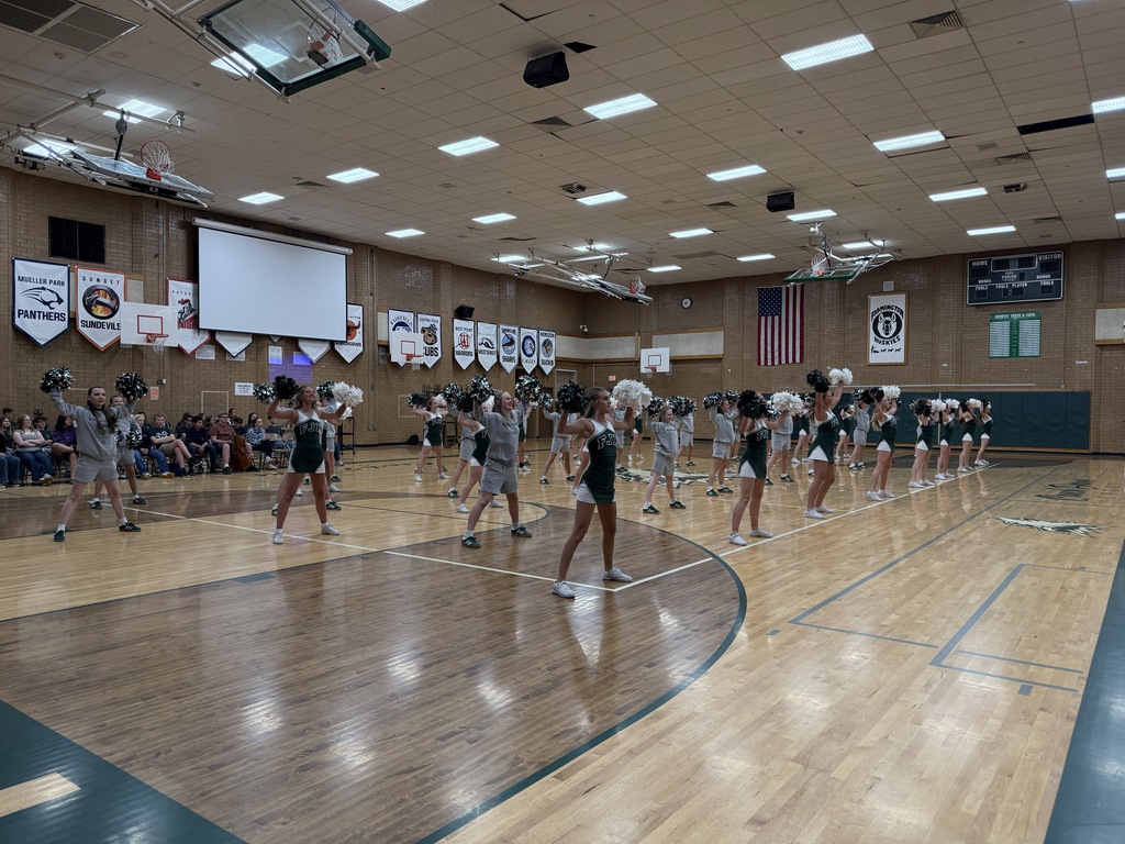 Cheer and dance company performing at the assembly. 