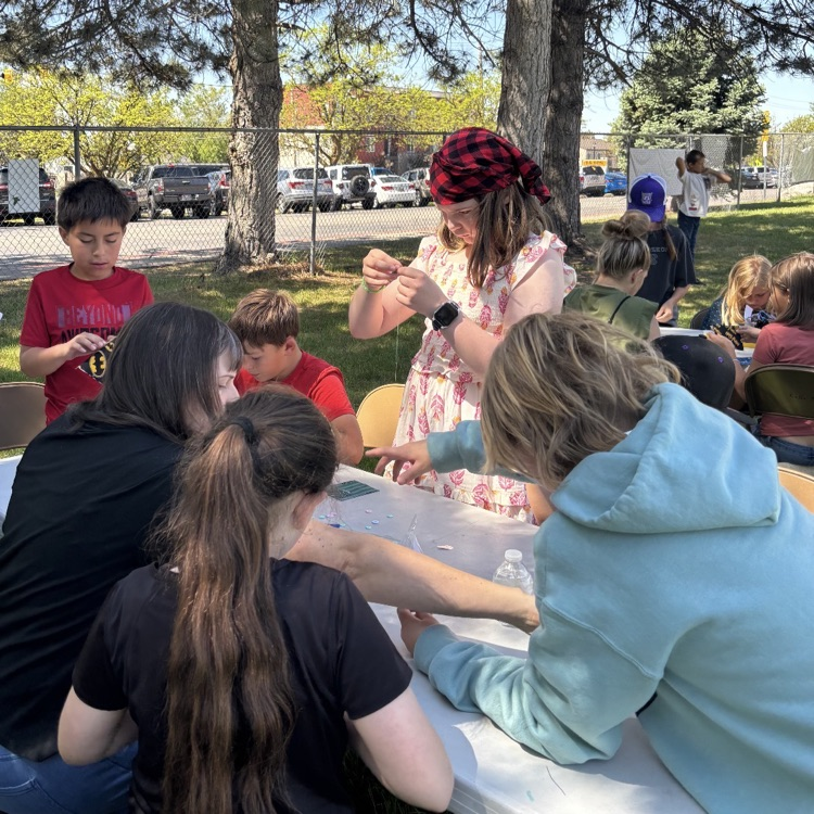 4th graders doing activities during Pioneer Day
