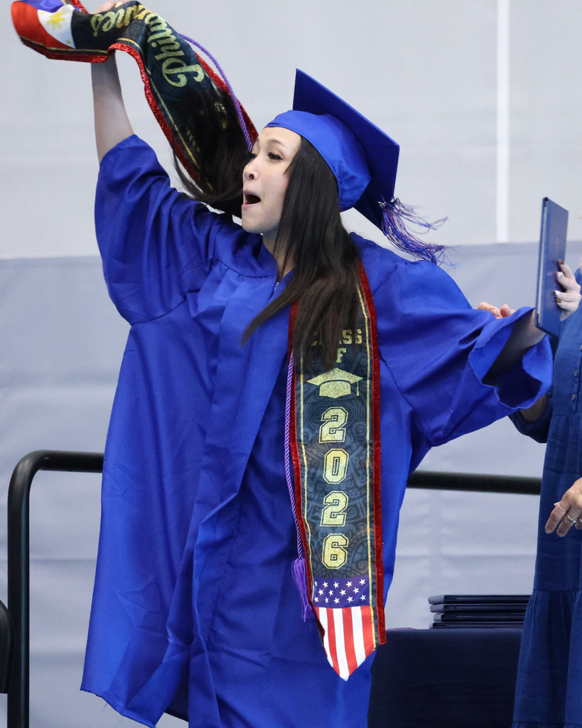 A Mountain High graduate celebrating.