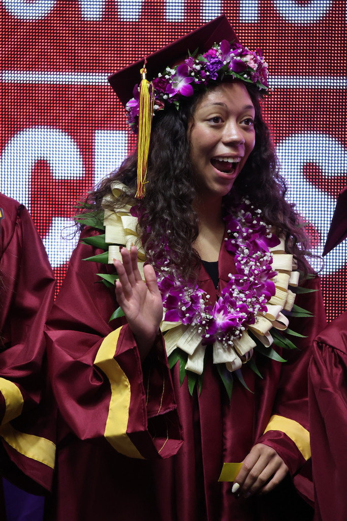A Viewmont High graduate looks surprised. 