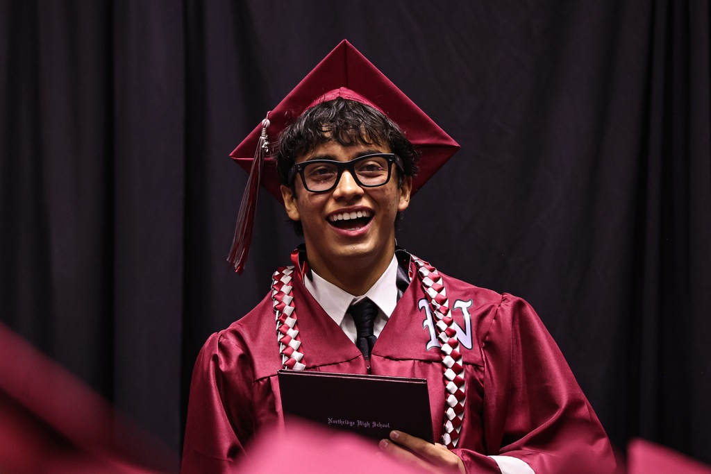 A Northridge High graduate smiling.
