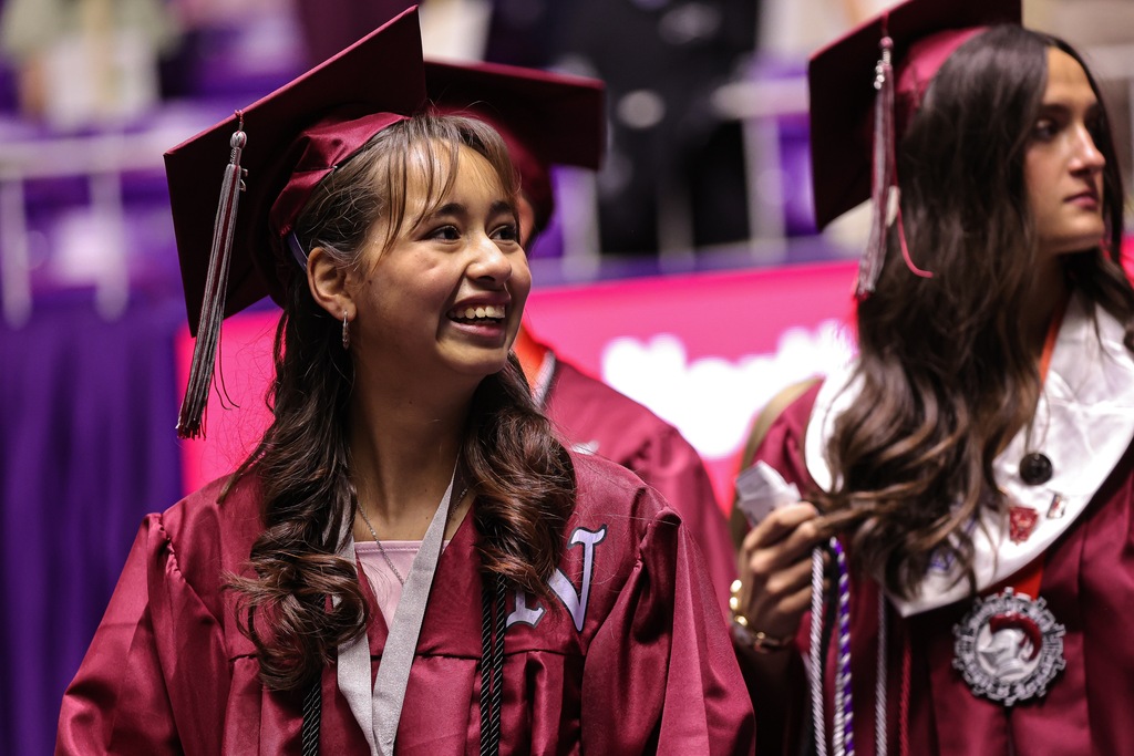 A Northridge High graduate smiling and looking to the right.