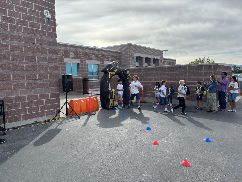 sixth graders walking in the grad parade