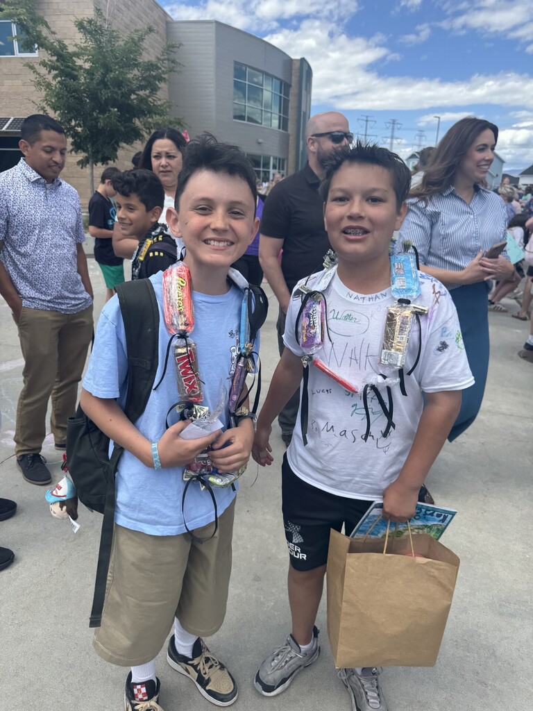 students pictured outside after their final walk as 6th graders