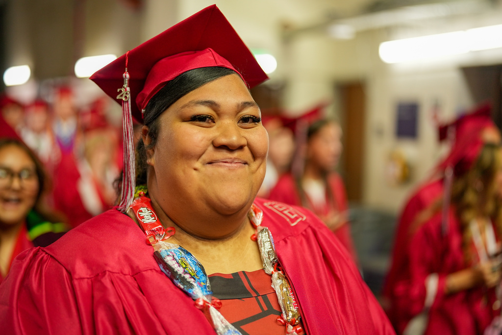 Bountiful High graduate smiles at the camera.