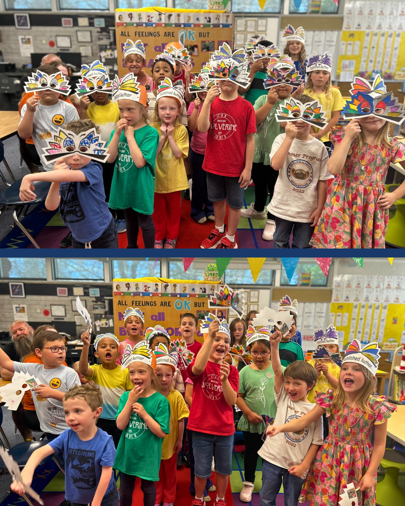 A group of students holding up open book masks over their eyes and wearing them as hats.