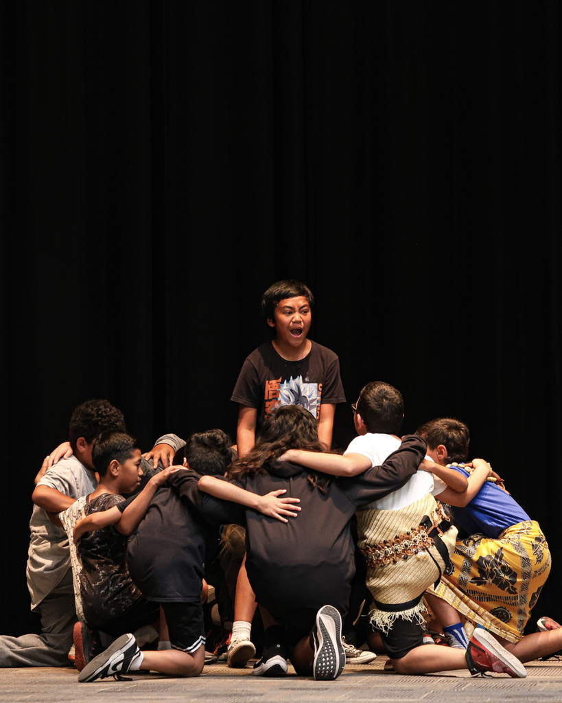 a large group of students from Foxboro Elementary perform the Hakka.