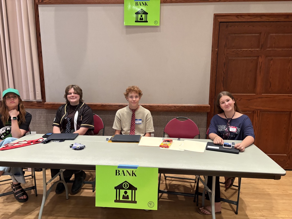 Students at the “bank” for Operation Outbreak.