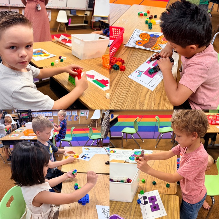 students completing a math activity with cubes to create an image