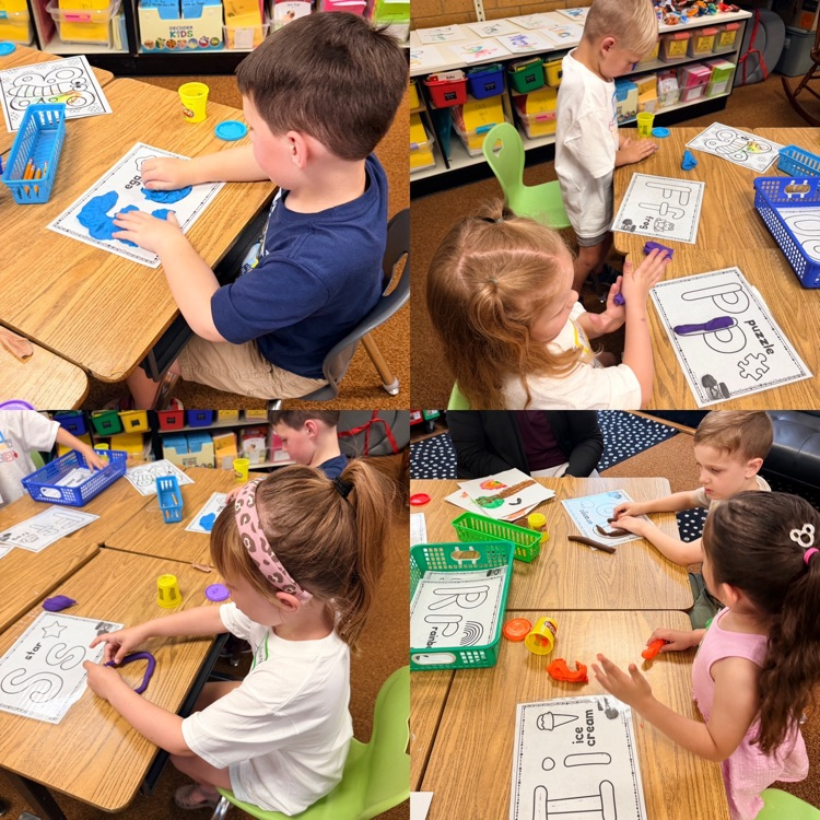 students using play doh to create letters, while practicing identifying letter names and their sounds