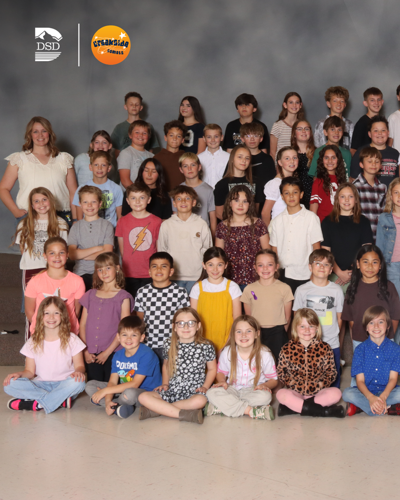 A large group of students smiling.