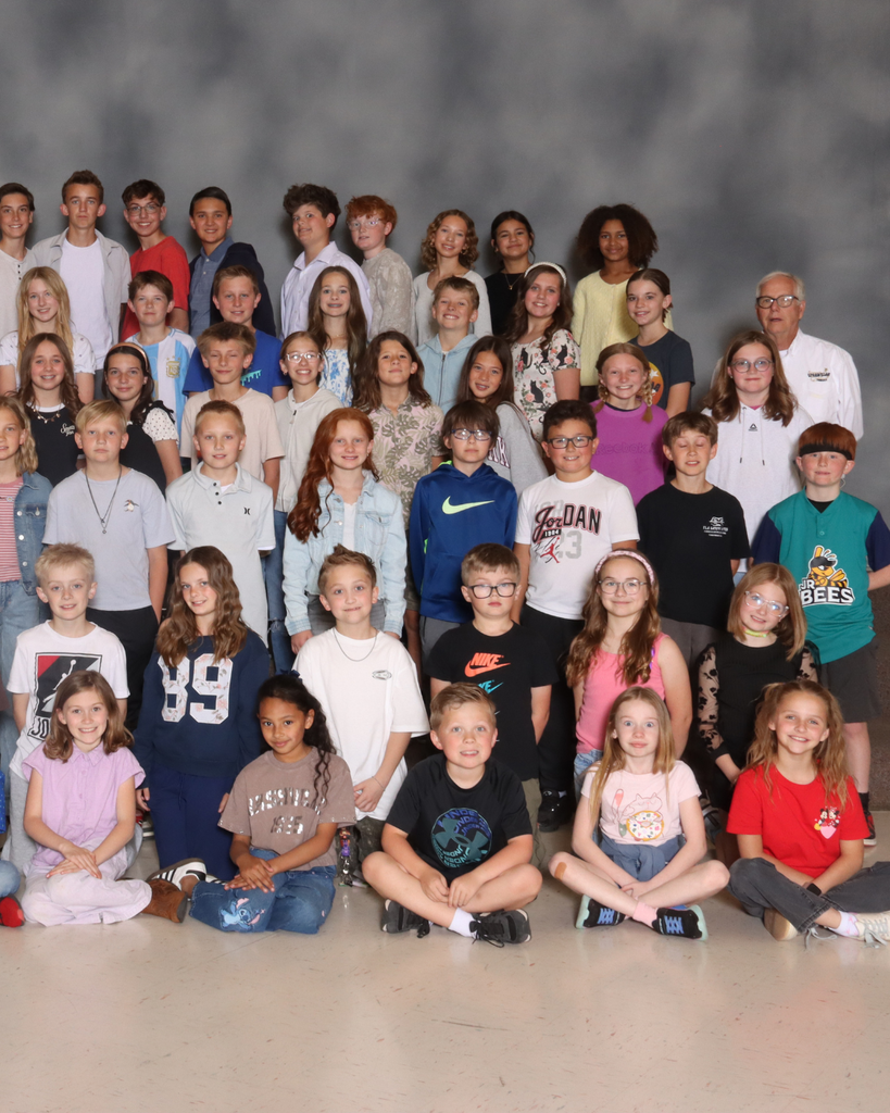 A large group of students smiling.