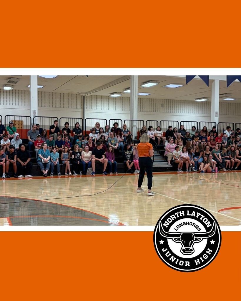 Principal Stumo speaks with the new incoming 7th graders in the school gym