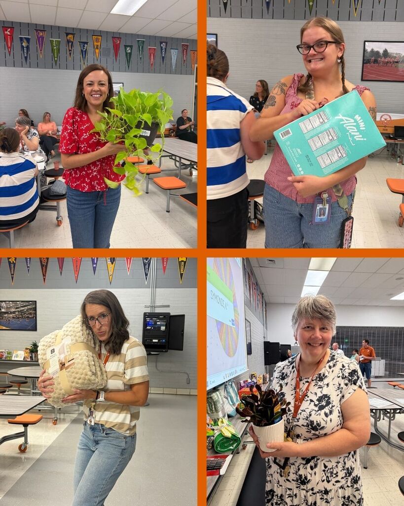 Teachers show prizes they won during a raffle.