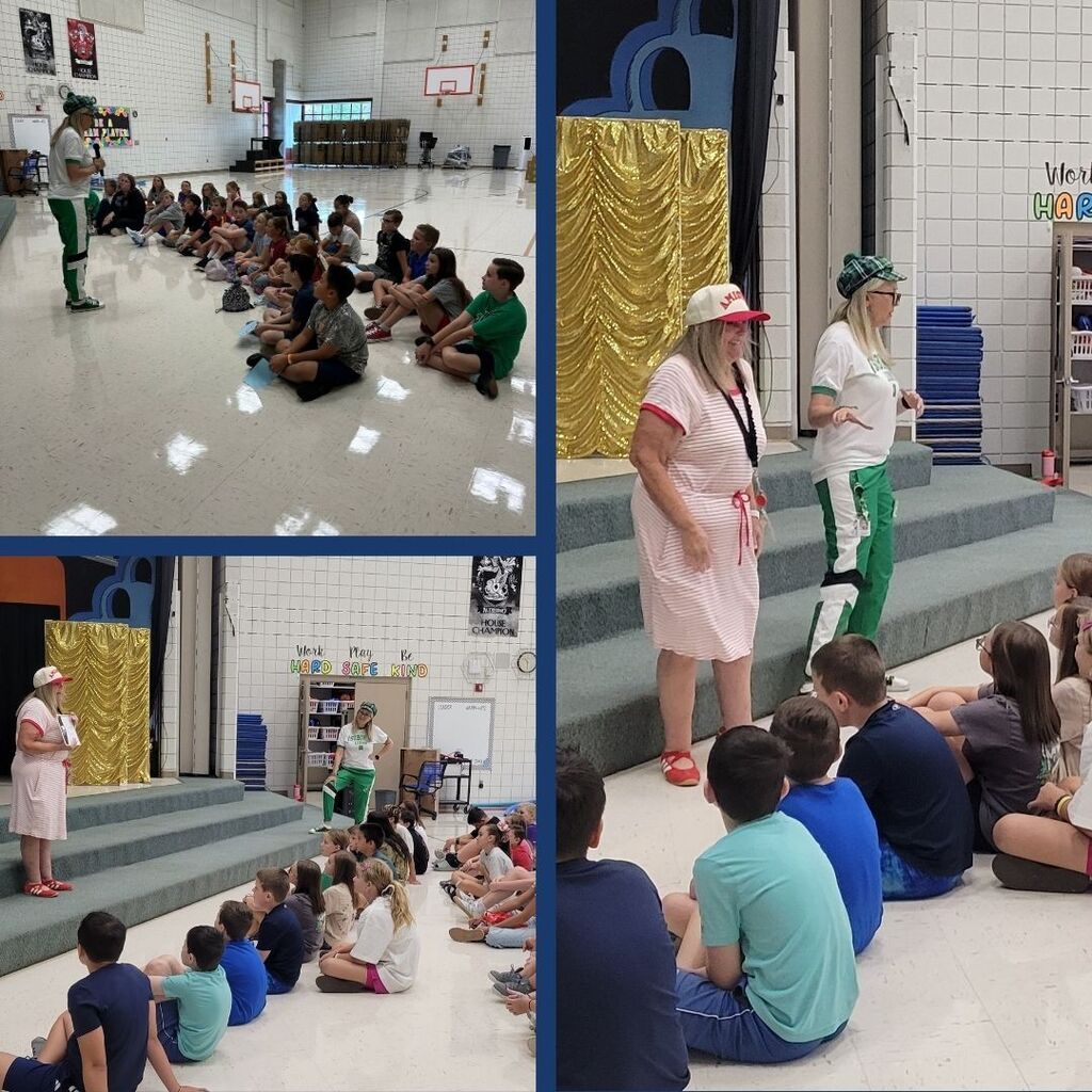 Students learning how to speak in a microphone in front of an audience.