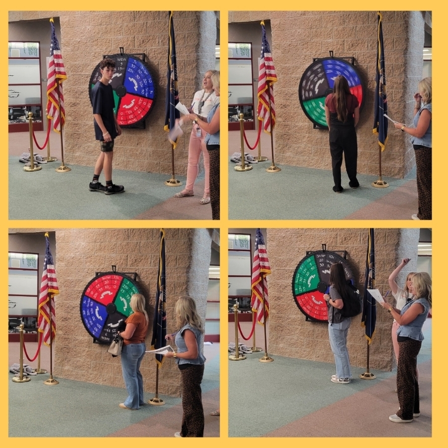 New teachers spin the house wheel.