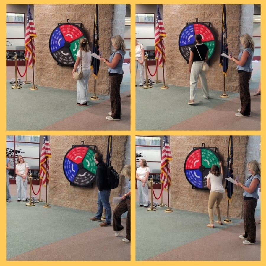 New teachers spin the house wheel.
