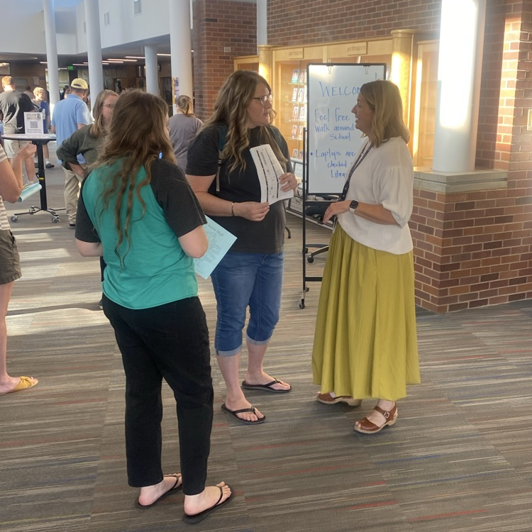 Parents and counselor visiting