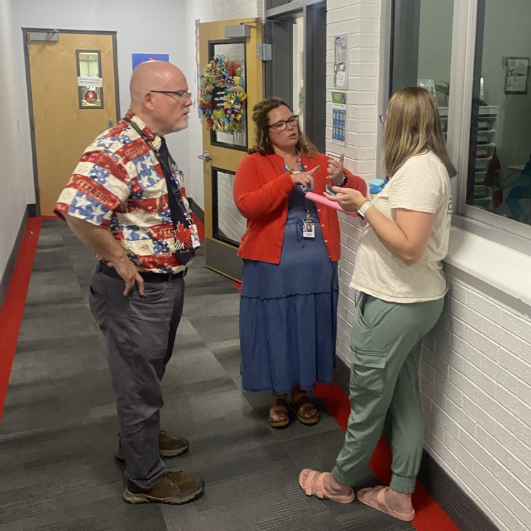 Teachers and parent visiting