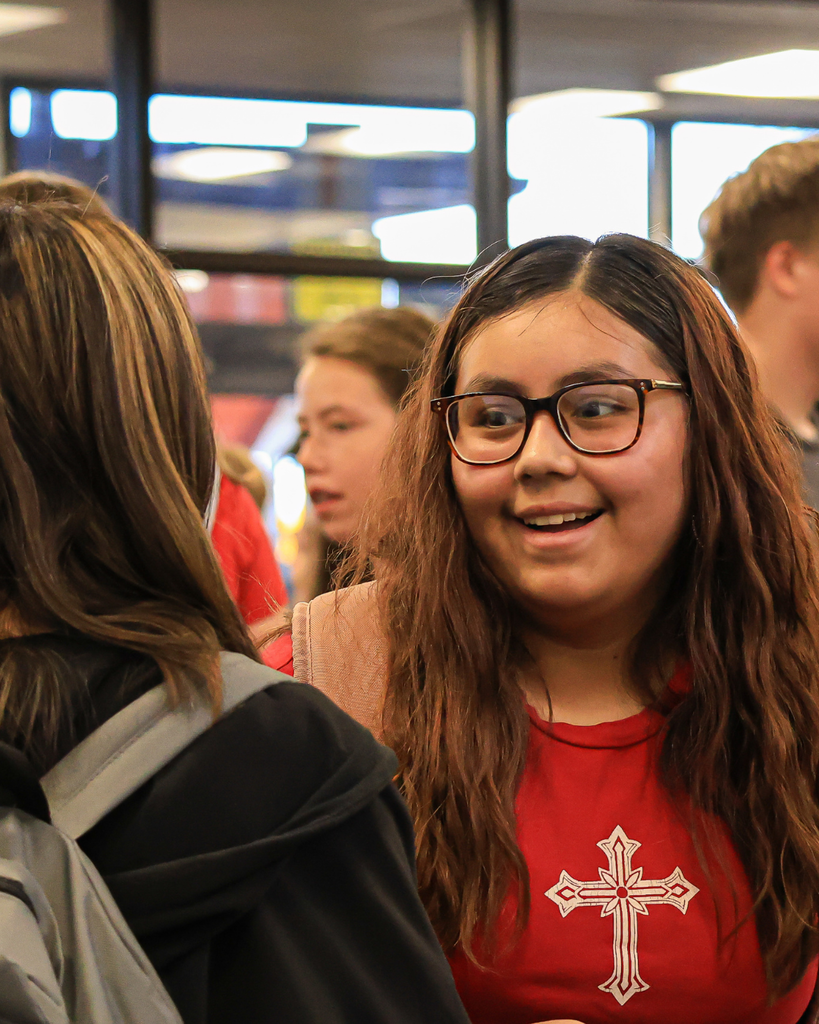 A student talking with another student.
