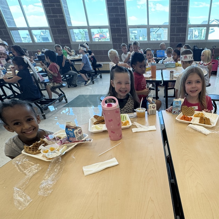 students eating lunch in the cafeteria