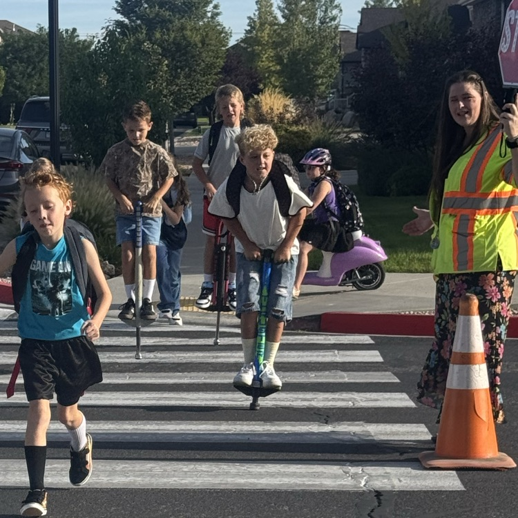 students crossing the crosswalk