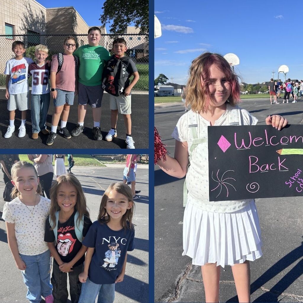 Students and teachers pose for pictures on the playground on the first day of school.