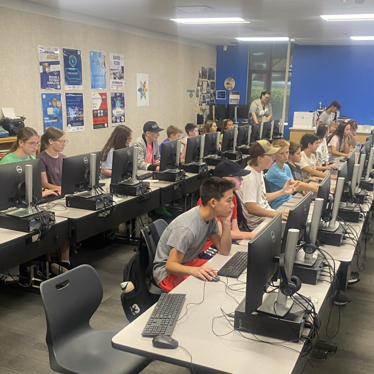 Students learning on computers