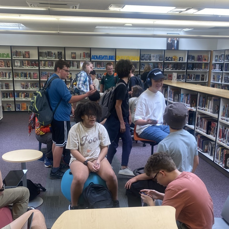 Students gathering in the library