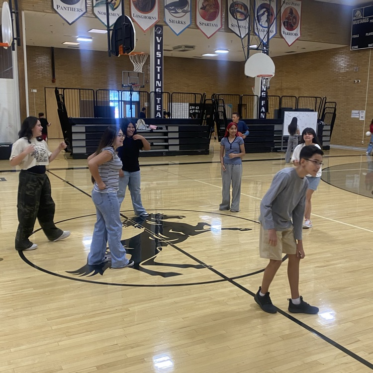 Students playing in the gym during lunch