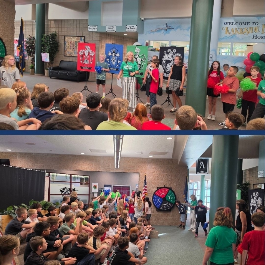 Students gather to spin the house wheel.