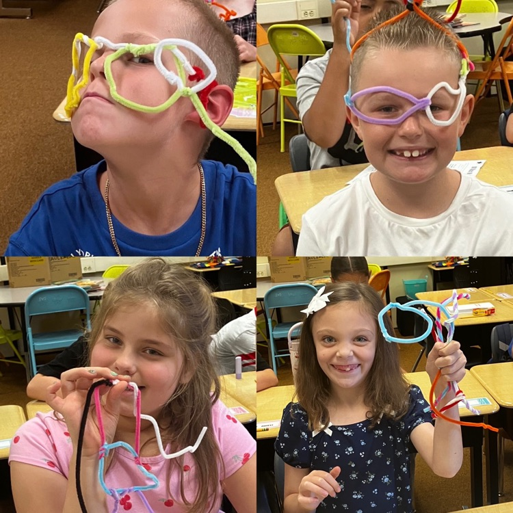 3rd graders showing their sculpture creations from STEM class