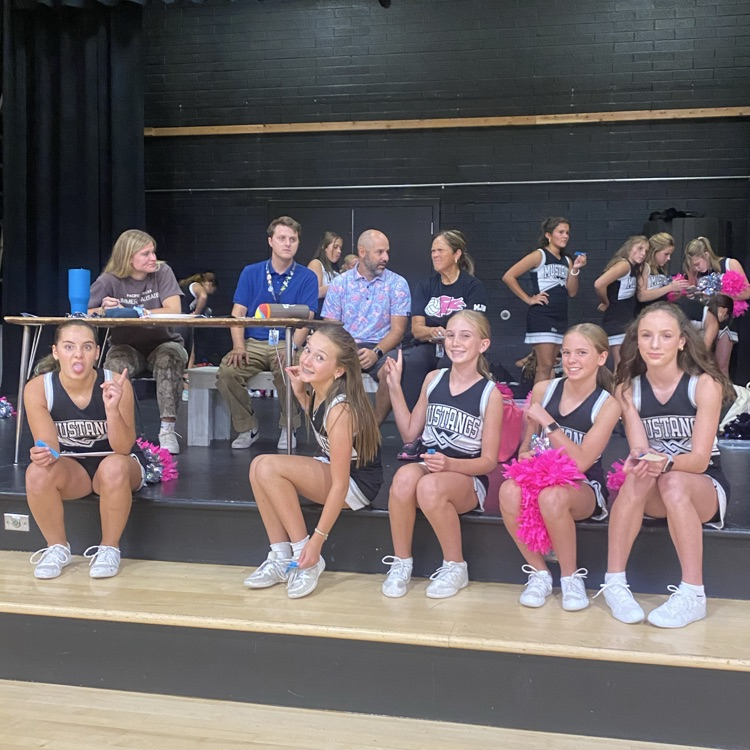 cheerleaders celebrating coaches and advisors