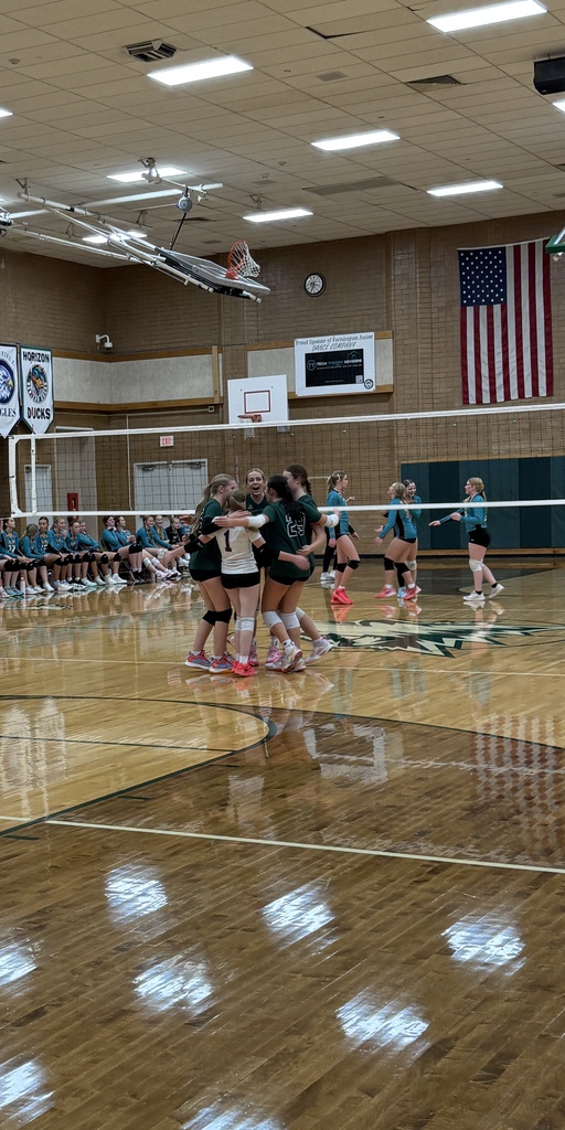 Teammates cheering each other on. 