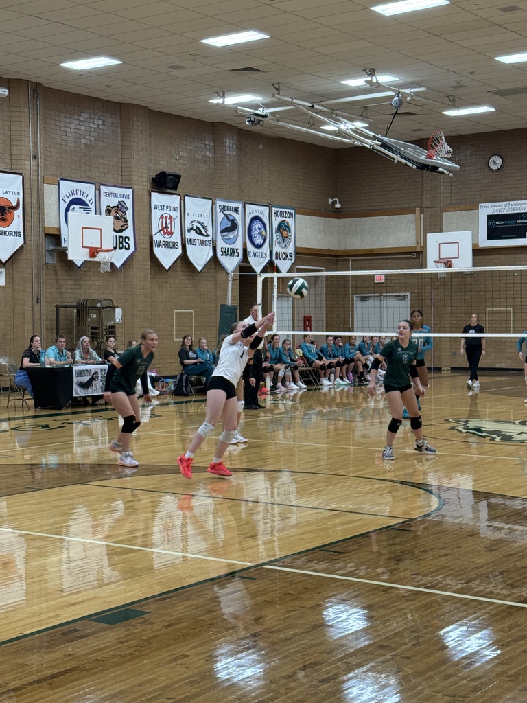 Athlete returning a serve. 