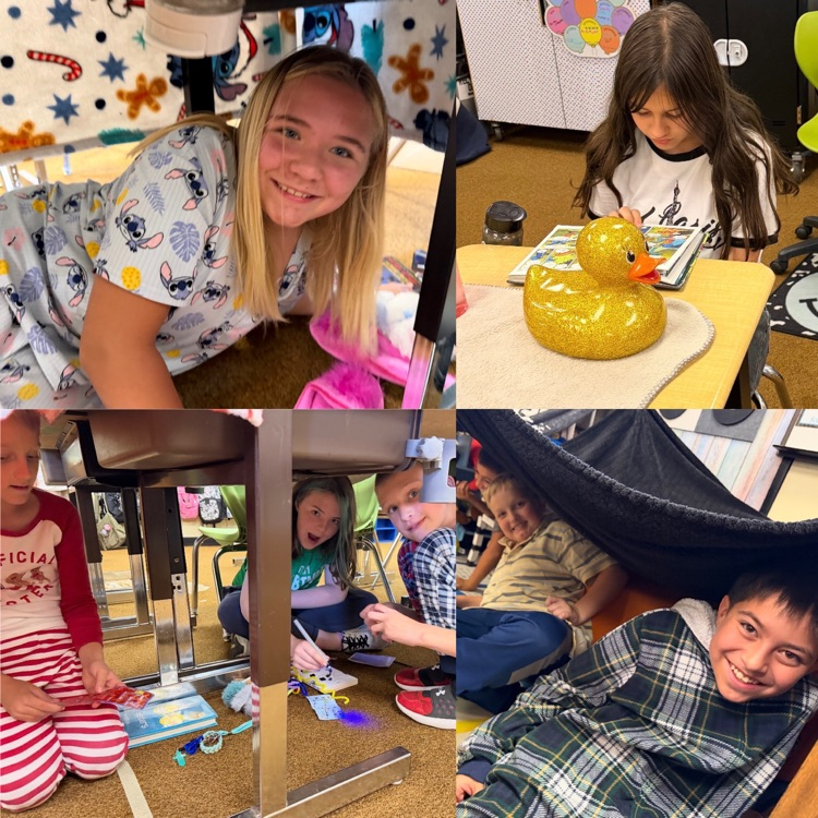 5th graders enjoying an earned pajama and reading party