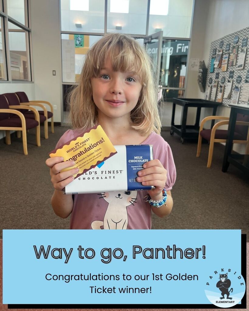 Female student holding a large chocolate bar and golden ticket."Way to go, Panther! Congratulations to our 1st Golden Ticket winner!"